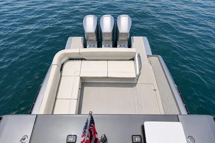 The aft deck and swim platform with the three Mercury Verado outboards